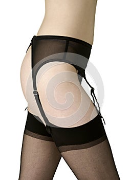 female torso with stockings and suspender belts isolated on white background