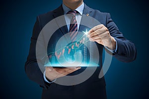 StockPhoto Stock market growth concept, businessman showing virtual hologram