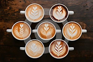 StockPhoto A variety of cup macchiatos presented in top view