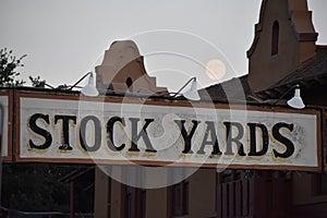 Stockyards and moon in FT Worth Texas.