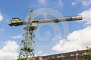 Stocznia Gdanska industrial factory with shipyard cranes