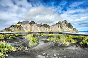 Stokksnes Mountain on Vestrahorn Cape during Beautiful Sunny Day, Iceland photo