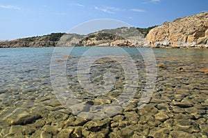 Stolac naturist stony beach on the island of Rab in Croatia