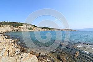 Stolac naturist stony beach on the island of Rab in Croatia