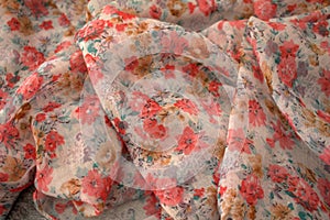 Stole in printed fabric with floral and abstract designs