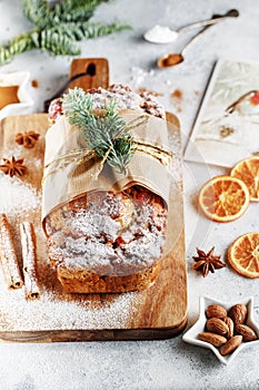 Stollen is a fruit bread of nuts, spices, and dried or candied fruit, coated with powdered sugar. It is a traditional German bread