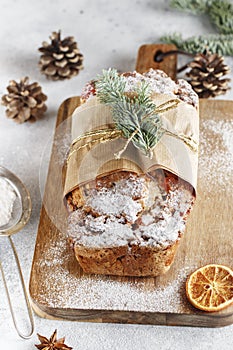 Stollen is fruit bread of nuts, spices, dried or candied fruit, coated with powdered sugar. It is traditional German bread eaten