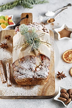 Stollen is fruit bread of nuts, spices, dried or candied fruit, coated with powdered sugar. It is traditional German bread eaten