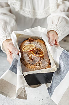 Stollen is fruit bread of nuts, spices, dried or candied fruit, coated with powdered sugar. It is traditional German bread eaten