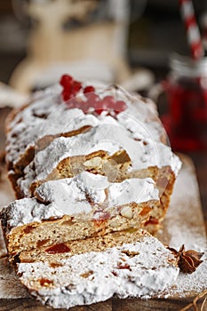 Stollen is fruit bread of nuts, spices, dried or candied fruit, coated with powdered sugar. It is traditional German bread eaten