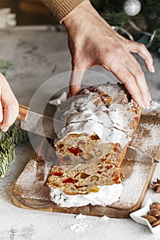 Stollen is fruit bread of nuts, spices, dried or candied fruit, coated with powdered sugar. It is traditional German bread eaten