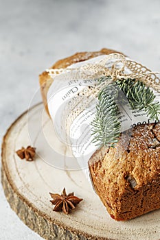 Stollen is fruit bread of nuts, spices, dried or candied fruit, coated with powdered sugar. It is traditional German bread eaten