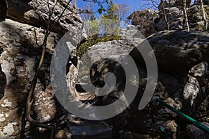 Stolowe Mountains National Park. Path in Rock Labyrinth hiking trail Bledne Skaly. Errant Rocks in Sudetes Mountains near Kudowa-