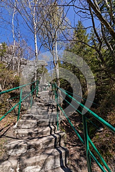 Stolowe Mountains National Park. Path in Rock Labyrinth hiking trail Bledne Skaly. Errant Rocks in Sudetes Mountains near Kudowa-