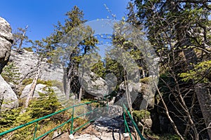 Stolowe Mountains National Park. Path in Rock Labyrinth hiking trail Bledne Skaly. Errant Rocks in Sudetes Mountains near Kudowa-