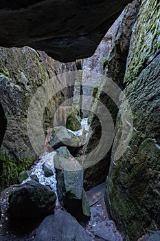 Stolowe Mountains National Park. Path in Rock Labyrinth hiking trail Bledne Skaly. Errant Rocks in Sudetes Mountains near Kudowa-