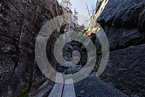 Stolowe Mountains National Park. Path in Rock Labyrinth hiking trail Bledne Skaly. Errant Rocks in Sudetes Mountains near Kudowa-