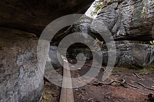 Stolowe Mountains National Park. Path in Rock Labyrinth hiking trail Bledne Skaly. Errant Rocks in Sudetes Mountains near Kudowa-