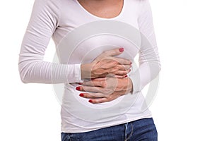 Stomach ache, pain or healthy concept : Caucasian woman using he