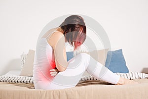 Stomach ache, woman with abdominal pain suffering at home