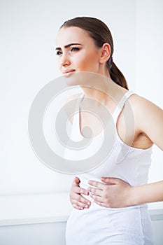 Stomachache. Woman Having Painful Stomachache, Female Suffering