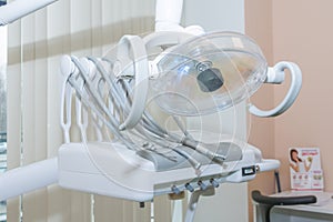 Stomatological instrument in the dentists clinic. Dental background: work in clinic, tooth replacement.dental equipment