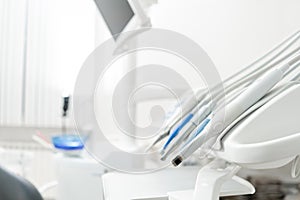 Stomatological instrument in the dentists clinic. Dental work in clinic. Operation, tooth replacement. Medicine, health