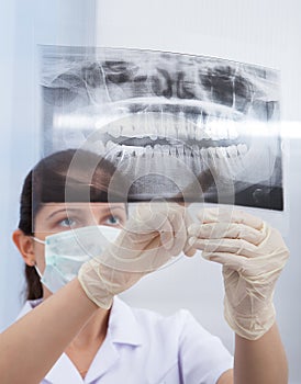 Stomatologist Pointing At Jaw Xray