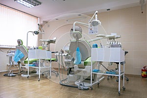 Stomatology interior of dental clinic with professional chair. Dentistry, medicine, medical equipment and stomatology concept