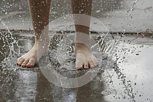 Stomping in the puddle. photo