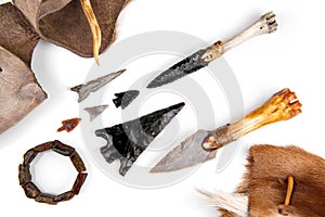 Stone Age Tools isolated on white Background - Stone Age Knives and Obsidian Arrows