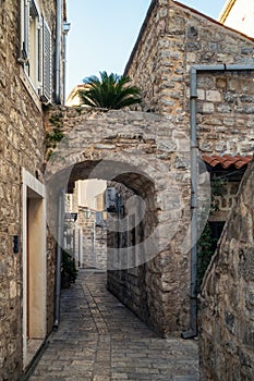 Stone alley in the center of the old town of Budva