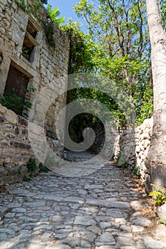 Stone alley French village oppÃ¨de le vieux in Provence Luberon Vaucluse France