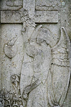 Stone angel bas relief on historic cemetery in Lommel, Belgium