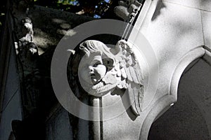 Stone angel carving with wings