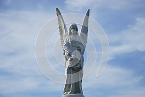 Stone angel statue on historic cemetery