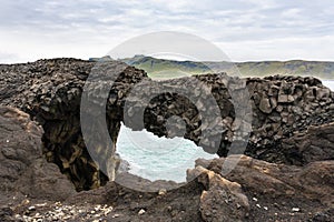 stone arch on Atlantic ocean coas in Iceland