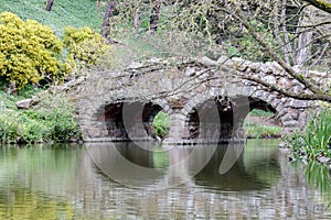 Stone arch bridge over Stow Lake