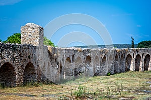 The stone arch canal for water transportation to the castle of Pylos, Peloponnese. photo