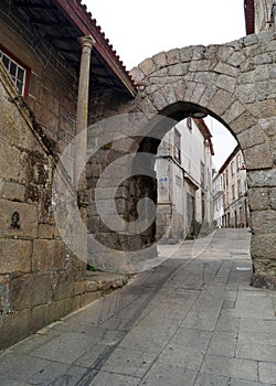 Stone arch of the medieval Sun Gate, Porta do Sol, Guarda, Portugal photo