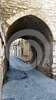 Stone arch on a narrow street