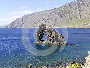 The stone arch Roque de Bonanza at El hierro coast, Canary Islands, Spain