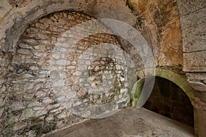 Stone arched walls of Arab Baths in Girona