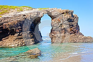 Stone arches on Playa de las Catedrales photo