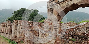 Stone arches and ruins at the haunted Bhangarh fort