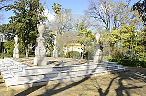 Stone architectural columns in park of Seville