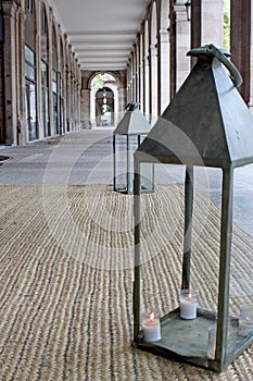 Stone archway with lanterns