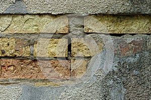 Stone texture of concrete and bricks on the old wall