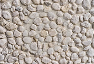 Stone background of grey pepples texture