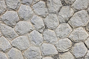 Stone background in a resort gives a feeling of solidity, strength, luxury